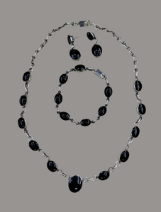 Juego de obsidiana con plata