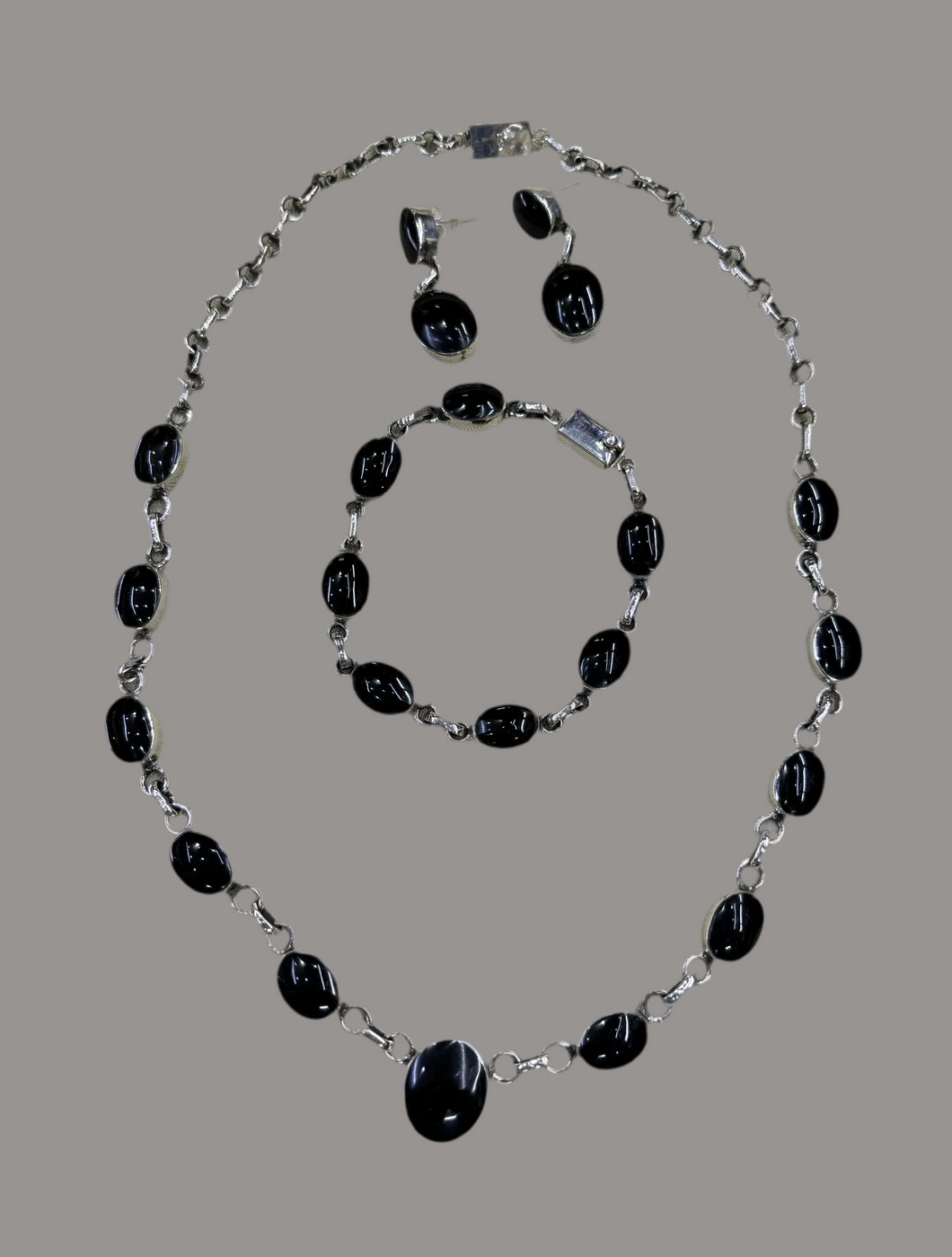 Juego de obsidiana con plata